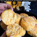 Sweet potato biscuits in a red lined cloth basket.