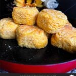 Sweet potato biscuits in a red lined cloth basket.