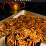 Butter toffee pretzels in a dark bowl on the baking sheet.