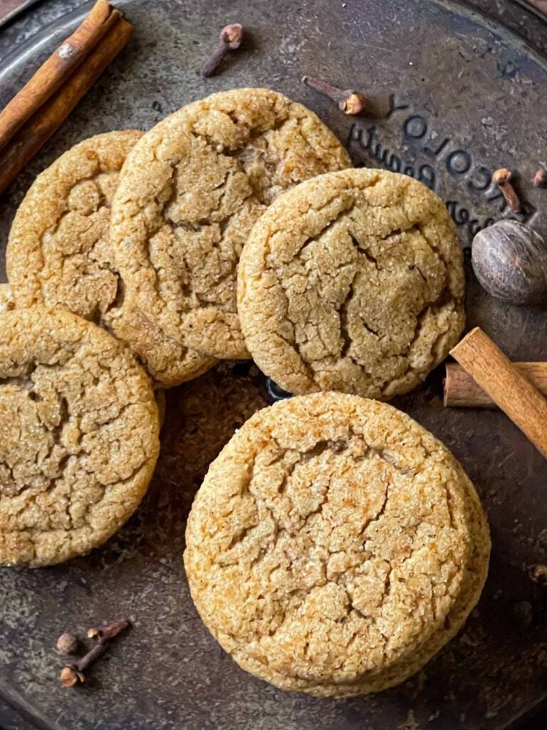 Chai sugar cookies on an old metal cake pan.