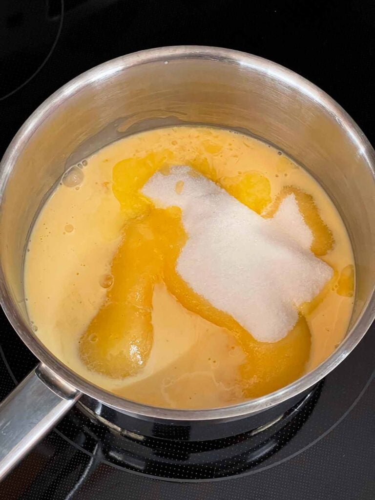 Butter, sugar, eggnog and salt combined in a medium saucepan.