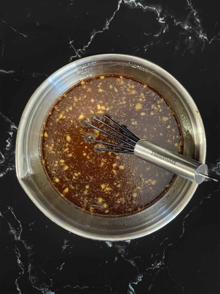 Bourbon sauce for bourbon chicken in a sauce pan.