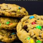 Monster cookies on a wire rack.