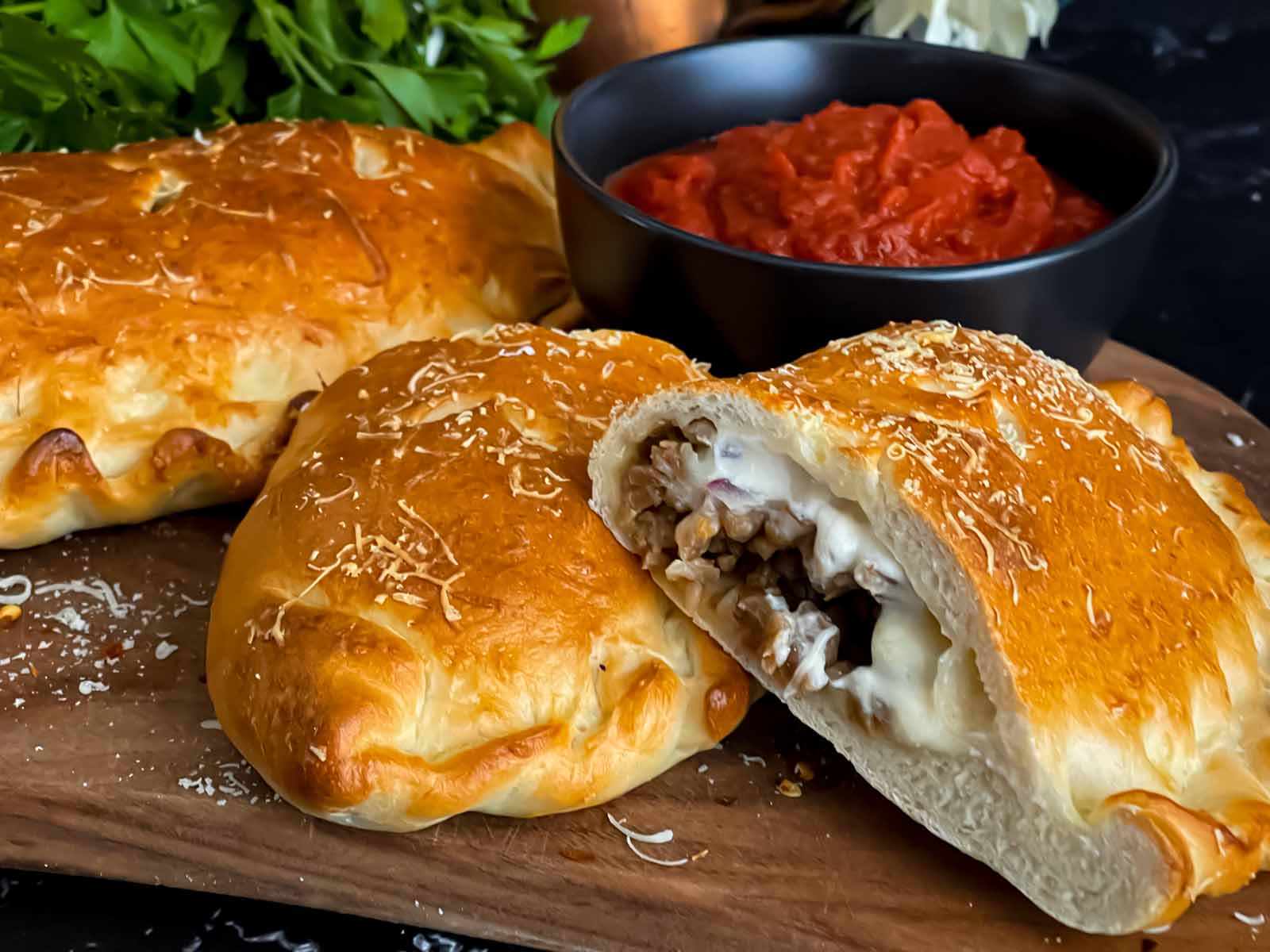 Italian Calzone Golden Crust Stuffed With Molten Cheese And Sauce Italian Calzone Golden Crust Stuffed With Molten Cheese And Sauce