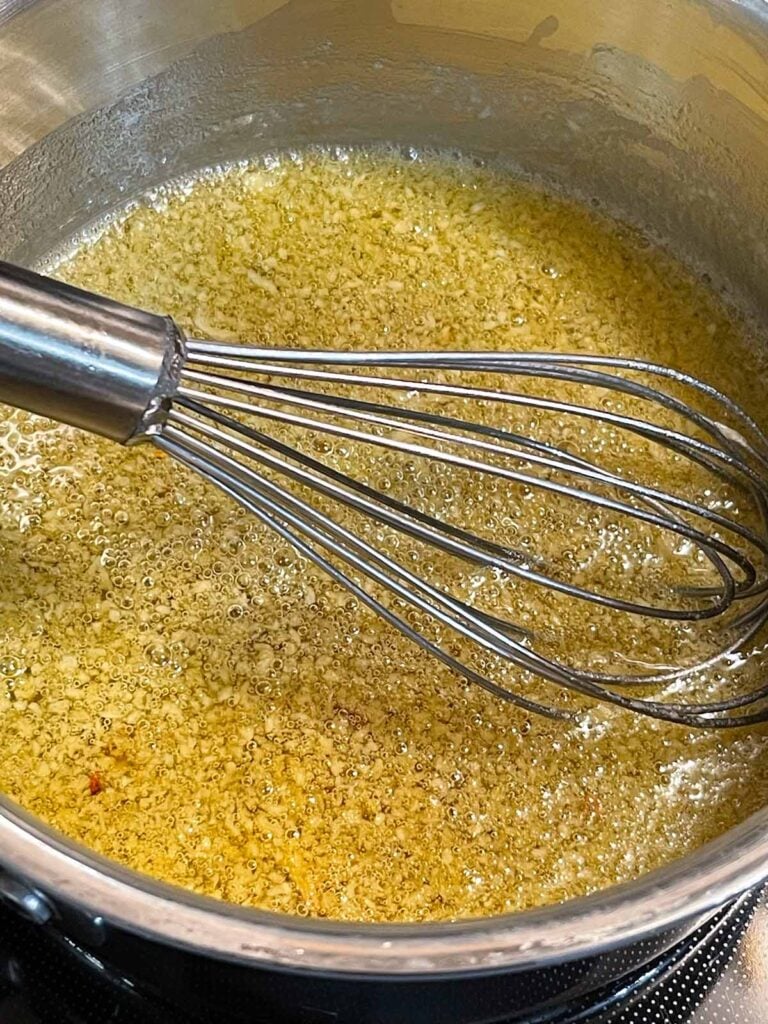 Garlic butter in a saucepan.