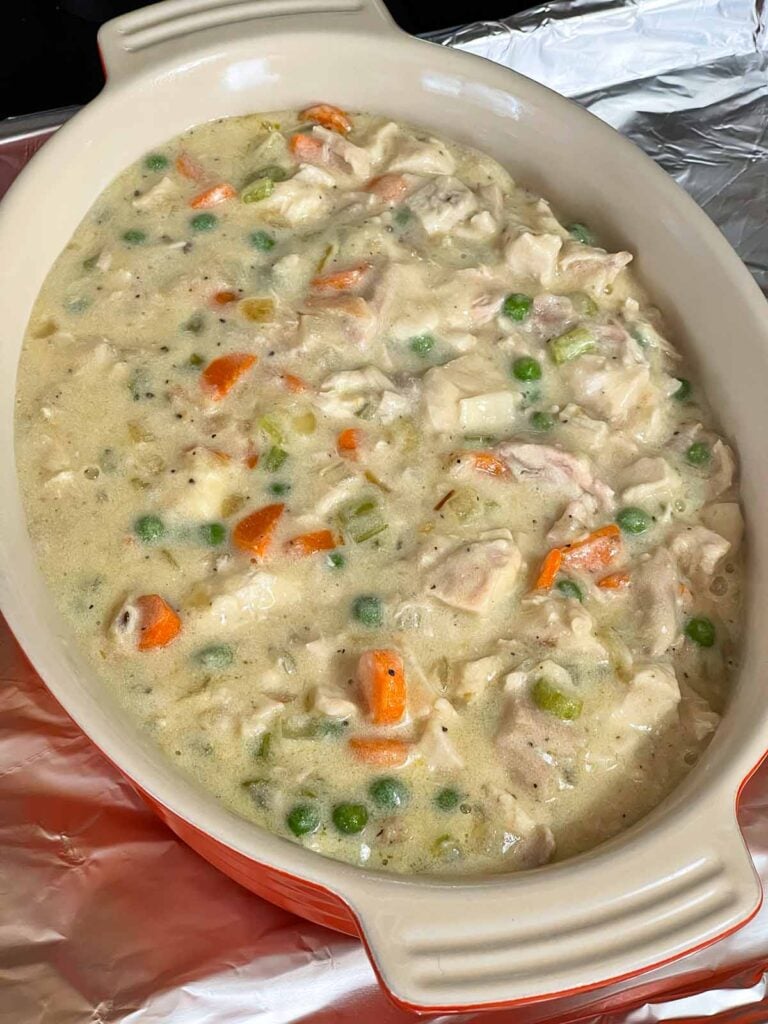 Chicken stuffing casserole mixture in a baking dish.