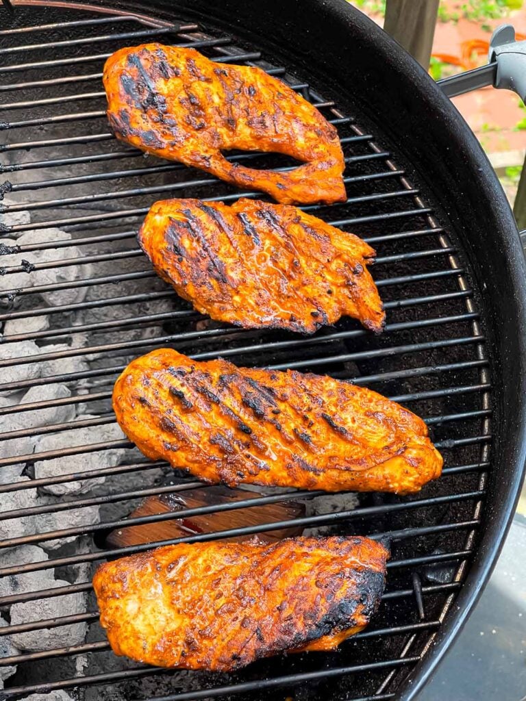 Southwest grilled chicken on the grill.