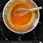 Southwest marinade ingredients whisked together in a bowl.