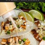 Adding a southwest sauce to grilled chicken tacos.