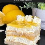 Limoncello tiramisu serving on a dark plate on a dark surface.
