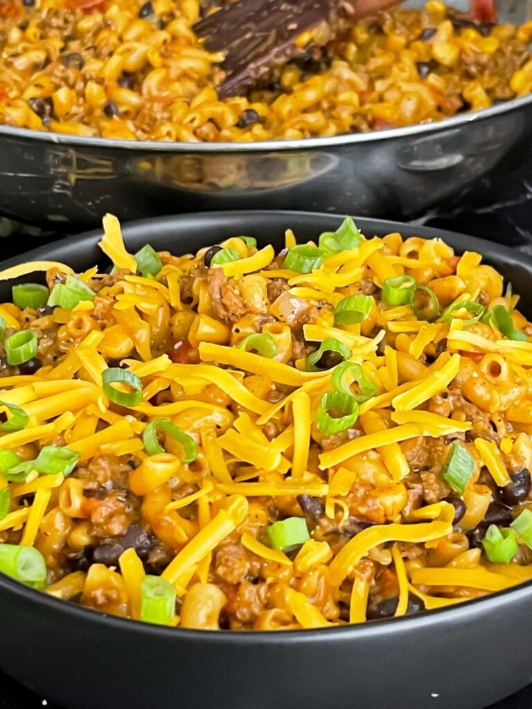 Taco pasta skillet dinner in a dark bowl.