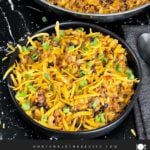 Taco pasta skillet dinner in a dark bowl.