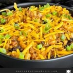 Taco pasta skillet dinner in a dark bowl.