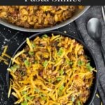 Taco pasta skillet dinner in a dark bowl.