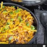 Taco pasta skillet dinner in a dark bowl.