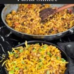 Taco pasta skillet dinner in a dark bowl.