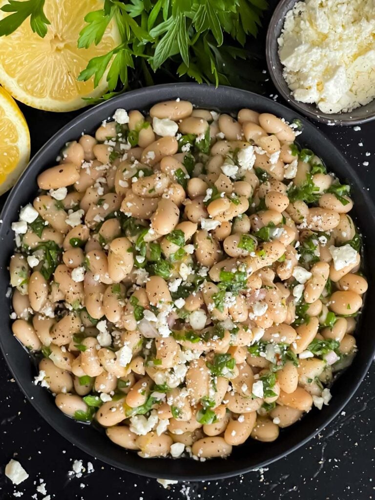 Lemon White Bean Salad in a dark bowl.