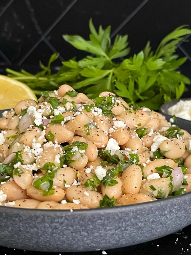 Lemon White Bean Salad in a dark bowl.