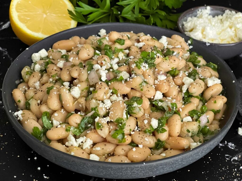 Lemon White Bean Salad in a dark bowl.