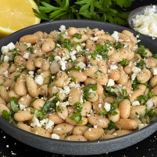 Lemon White Bean Salad in a dark bowl.