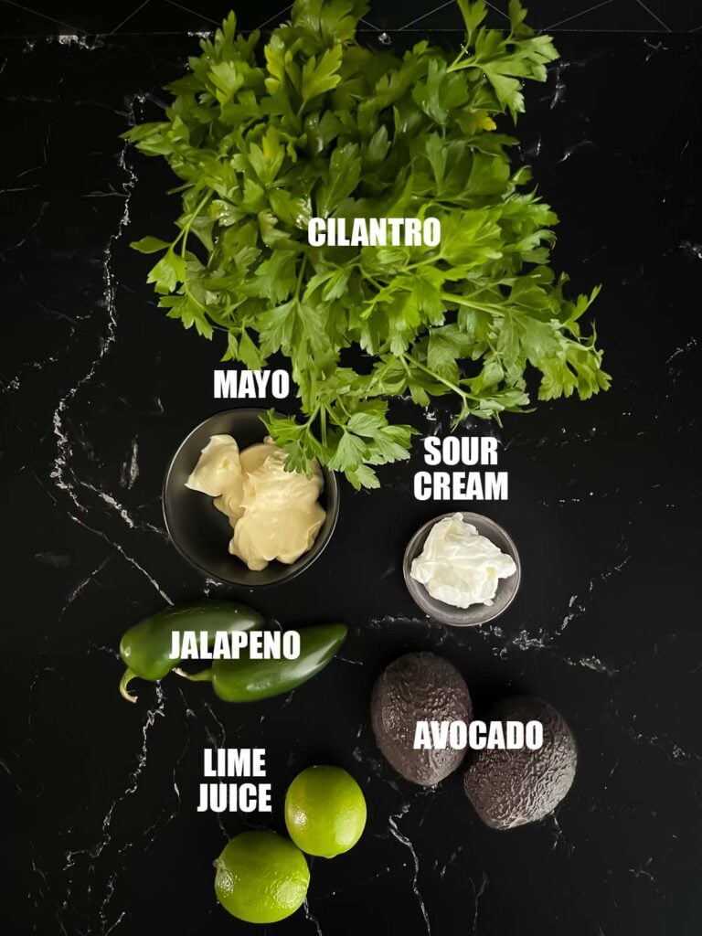 Ingredients for an avocado jalapeno sauce.