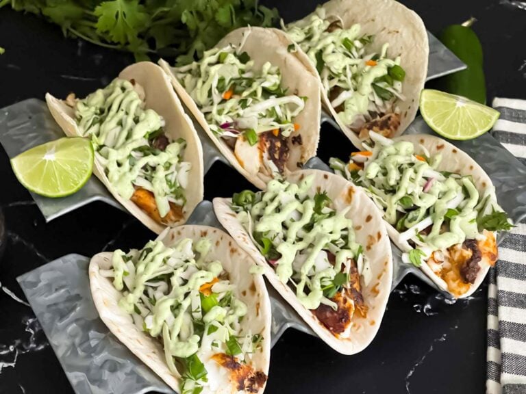 Blackened Fish Tacos on a dark background.