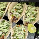 Blackened Fish Tacos on a dark background.