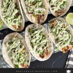 Blackened Fish Tacos on a dark background.