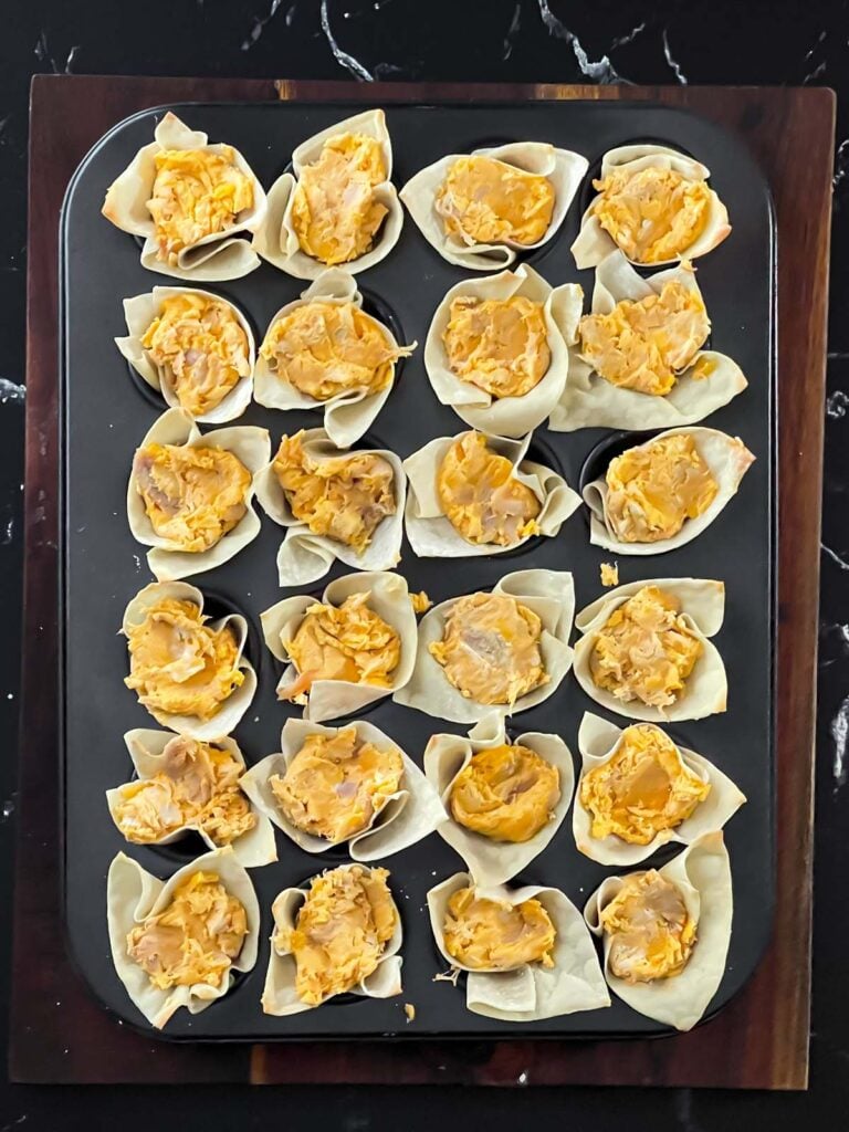 Buffalo chicken mixture in wontons.