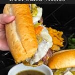 Italian beef sandwich over a ramekin of au jus.