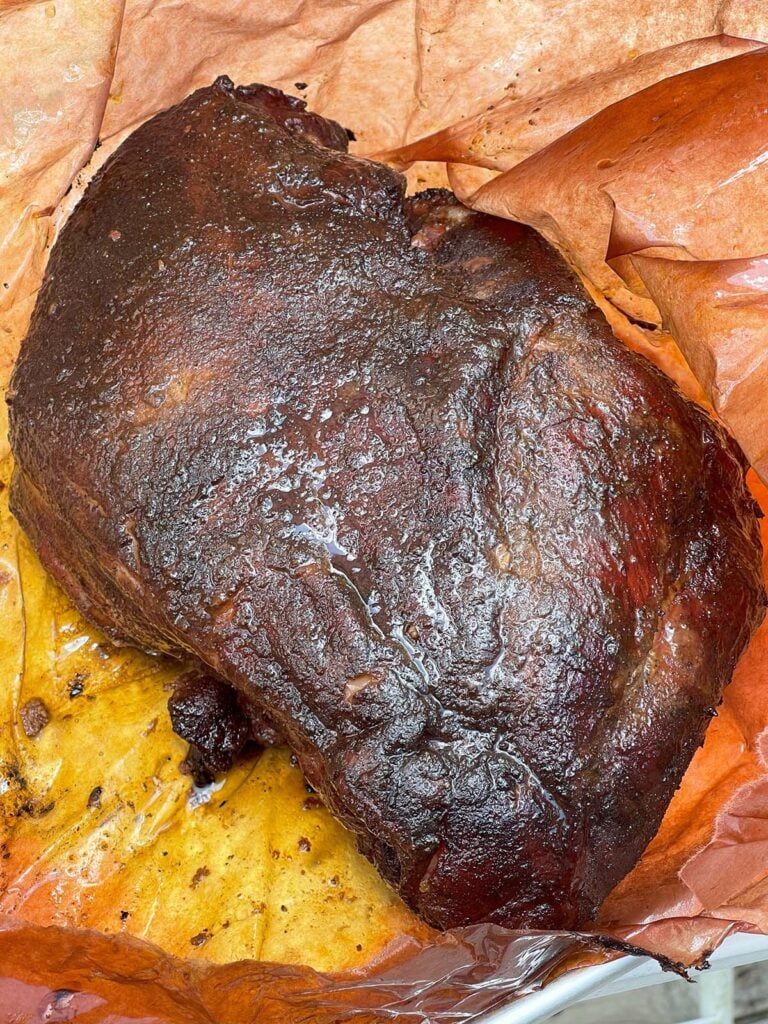Smoked pork butt on butcher's paper.