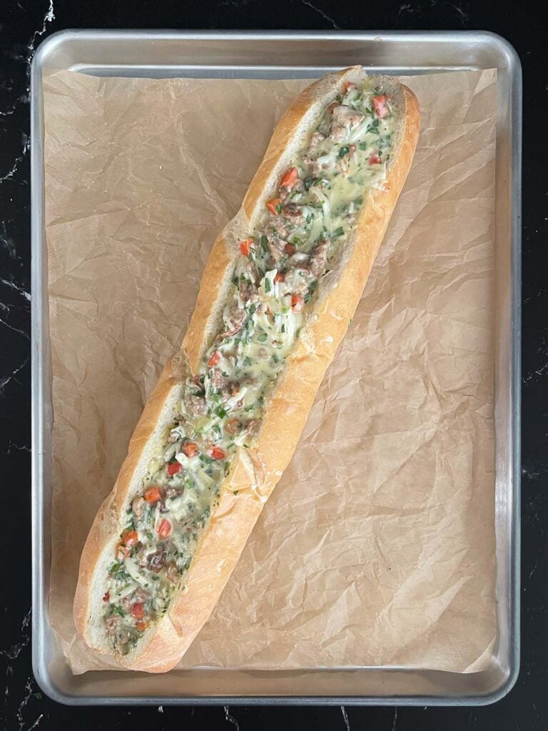 An egg mixture added to a hollowed out french bread loaf.