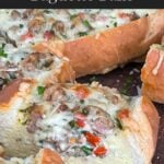 Sausage and Egg Baguette Bake cut up on a cutting board.