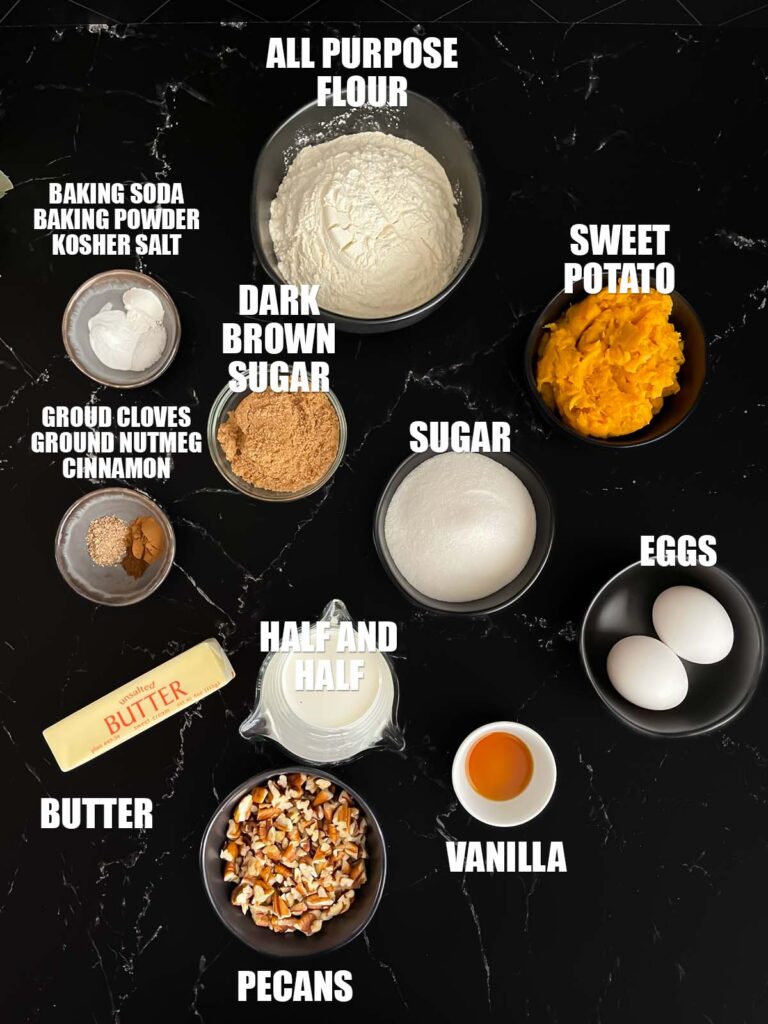 Sweet potato bread recipe ingredients on a dark surface.