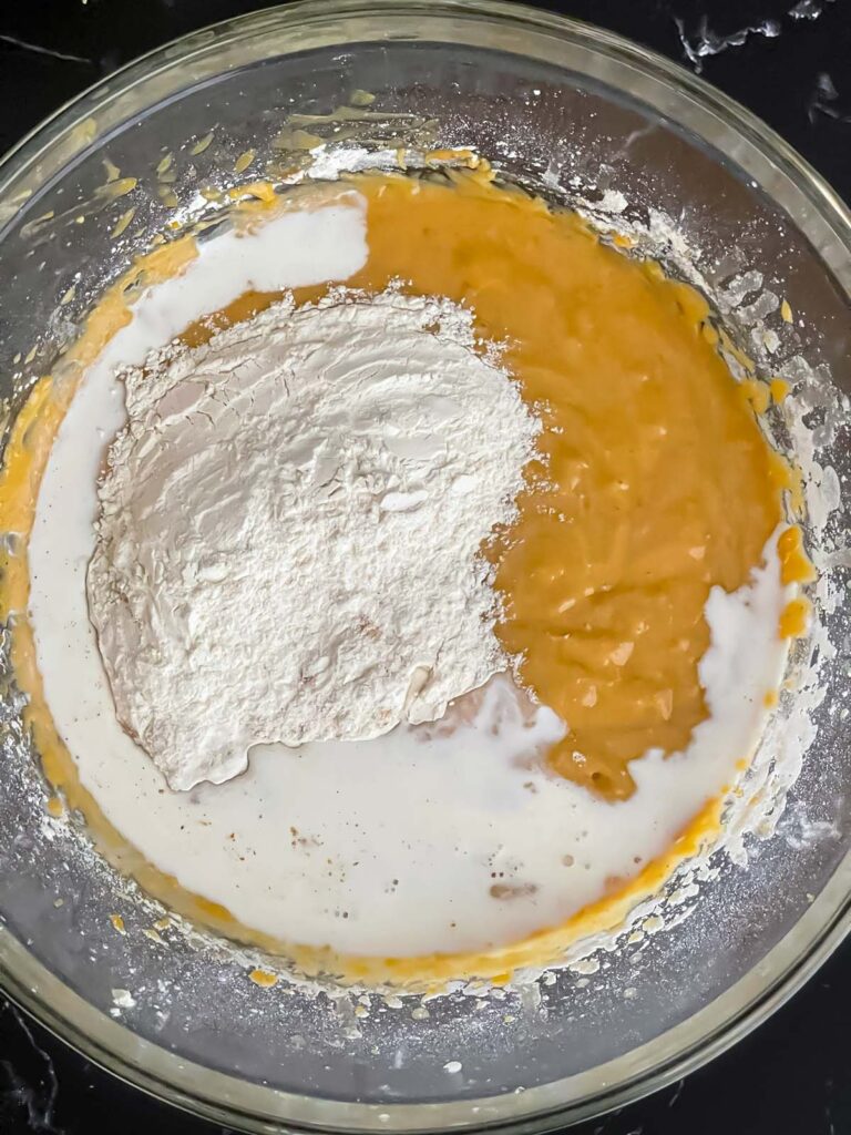 Dry ingredients and half and half added to the sweet potato bread batter.
