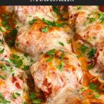 Easy baked parmesan meatballs garnished with chopped Italian flat leaf parsley.