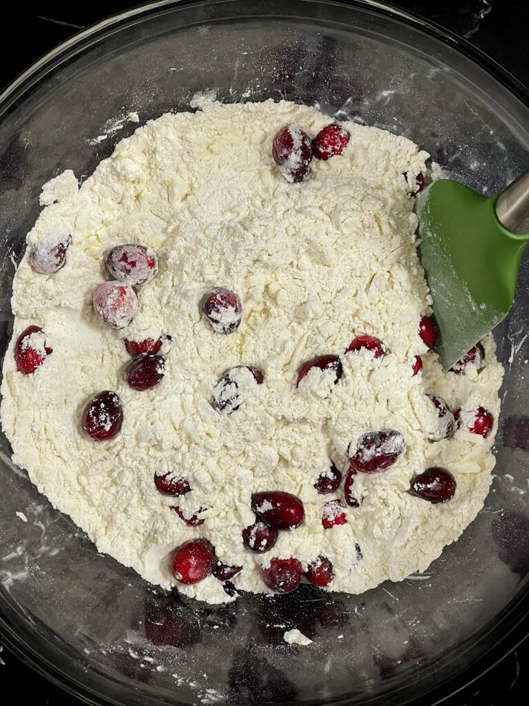 Fresh cranberries tossed in the dry ingredients mixture for cranberry orange scones.