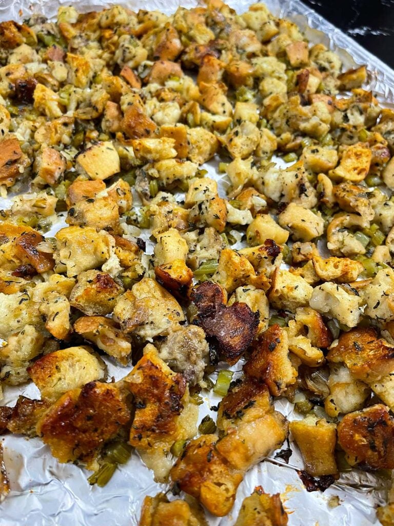 Crisped stuffing with golden edges after finishing in the oven.