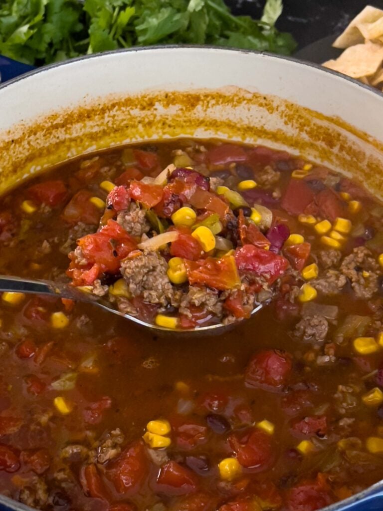 Taco soup in a dutch oven.