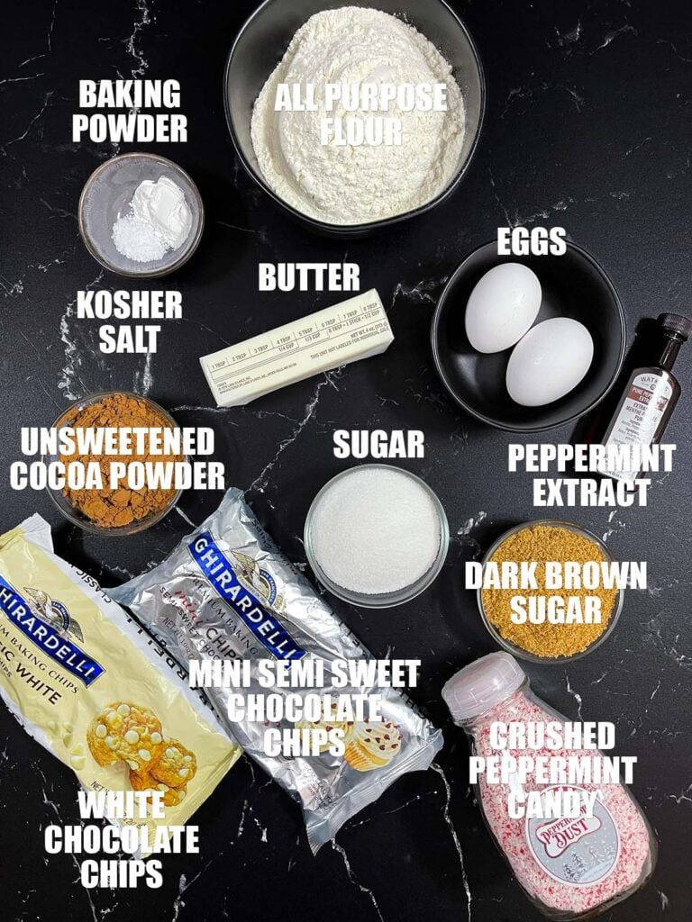 Chocolate peppermint biscotti recipe ingredients on a dark surface.