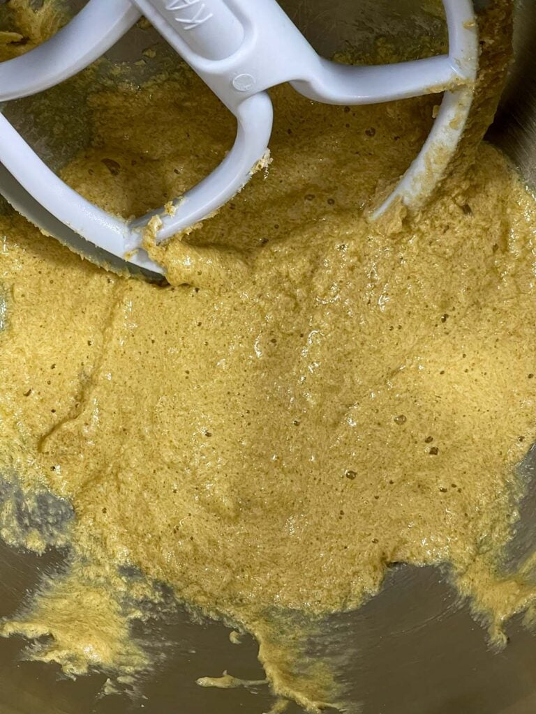 Eggs mixed into the creamed butter and sugars.