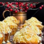 Eggnog muffins on a dark wooden board.