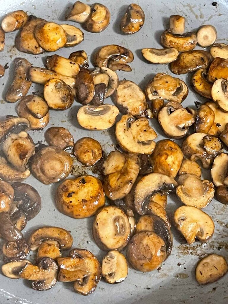 Mushrooms browned in skillet for mushroom gravy