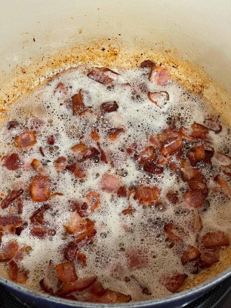 Rendered bacon in a dutch oven.