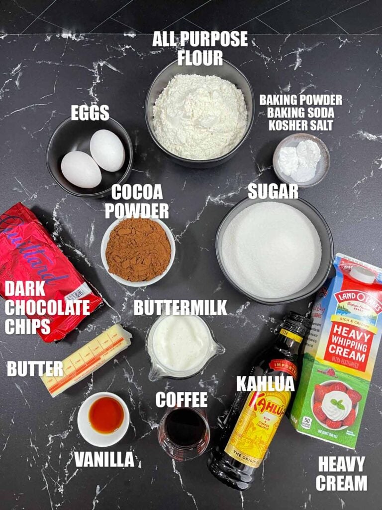 Chocolate Kahlua cake recipe ingredients on a dark surface.