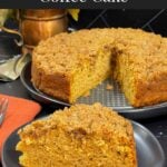 A single slice of sweet potato coffee cake on a dark plate.