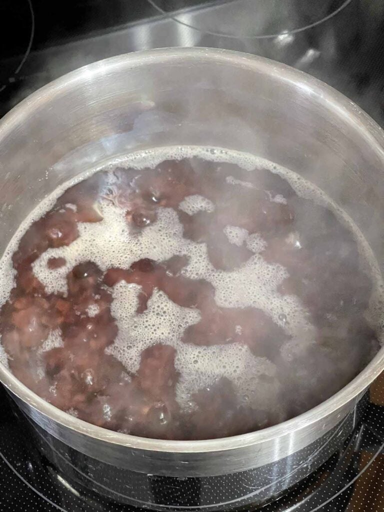 Wild rice cooking in a pot.