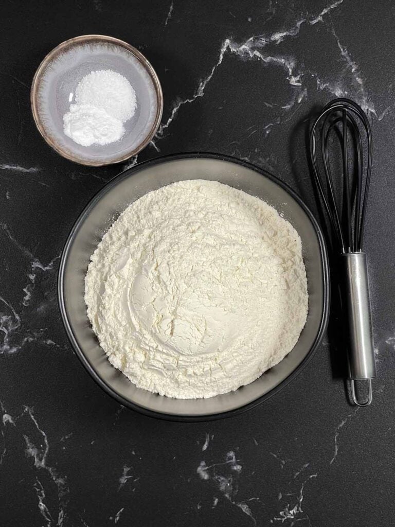 Bowl of all-purpose flour whisked with baking soda and kosher salt.
