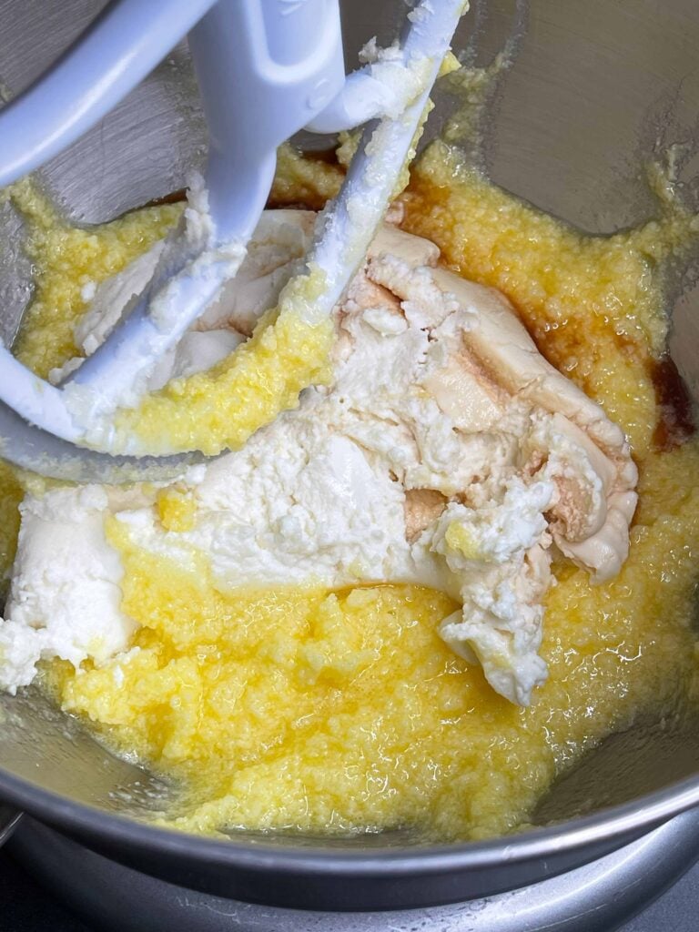 Ricotta cheese and vanilla added to the wet ingredients for the chocolate chip ricotta cake recipe.