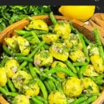 Green bean potato salad with lemon dill dressing served in a bowl.